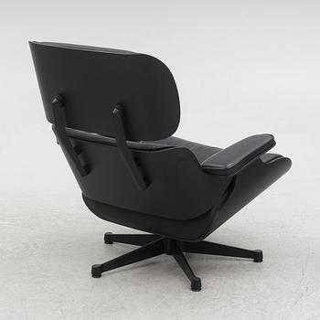Charles & Ray Eames, an "Eames Lounge Chair" with ottoman, Vitra, 21st century.
