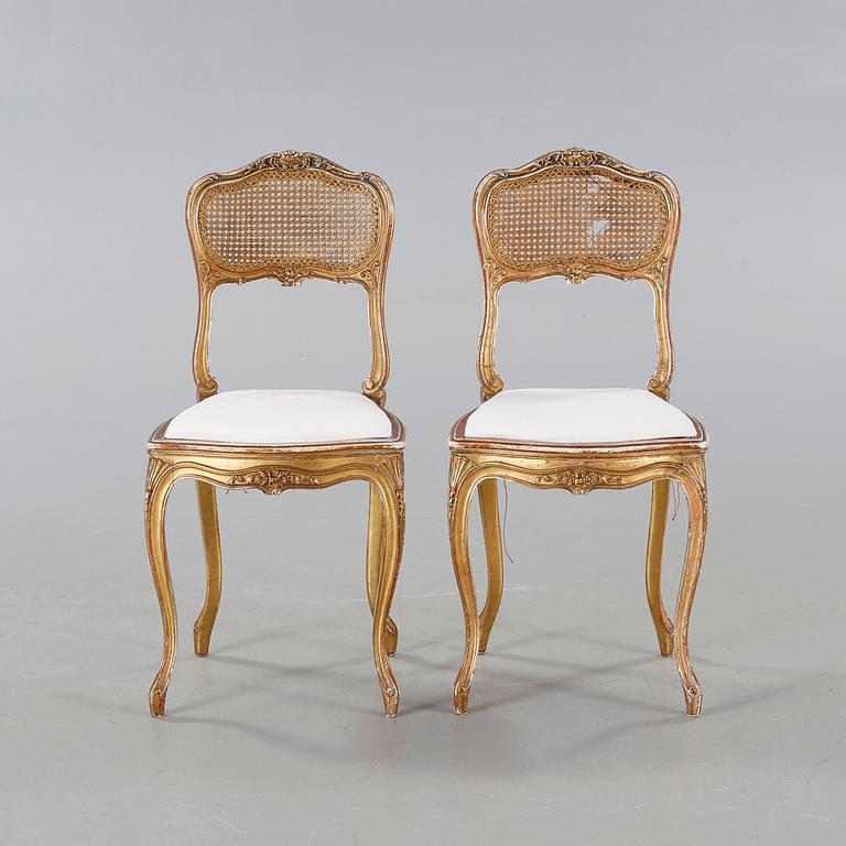A pair of chairs from the first half of the 20th century.