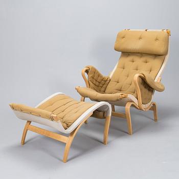 Bruno Mathsson, A "Pernilla" armchair with footstool, for DUX, designed in 1944.