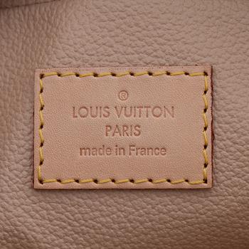 LOUIS VUITTON, a monogram canvas toiletry case.