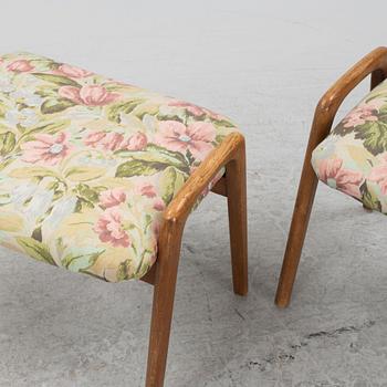 A pair of ottomans, 20th century.