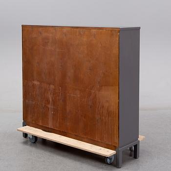 A first half of the 20th Century painted book case.