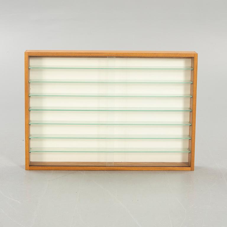 Glass display cabinet, second half of the 20th century.