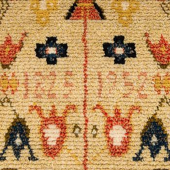 A Finnish folkart ryijy-rug dated 1825-1952. Circa 195 x 130 cm.