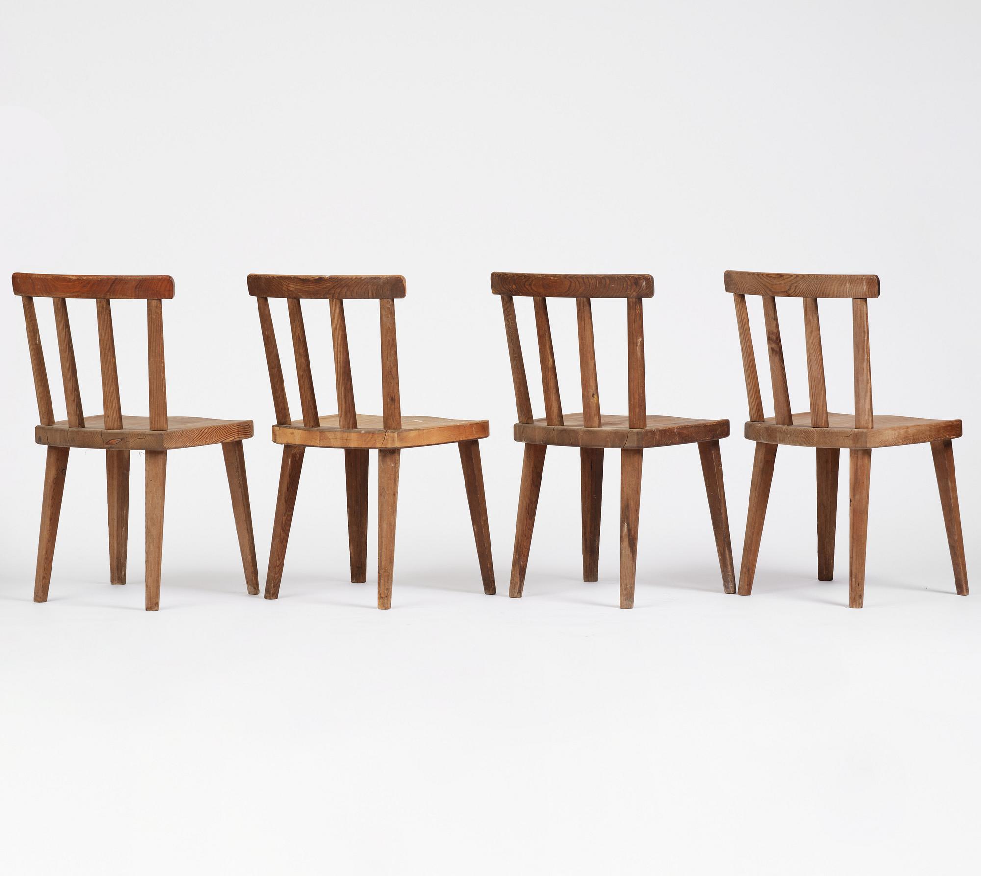 Axel Einar Hjorth, a set of four stained pine "Utö" chairs, Nordiska Kompaniet, Sweden, 1930s.
