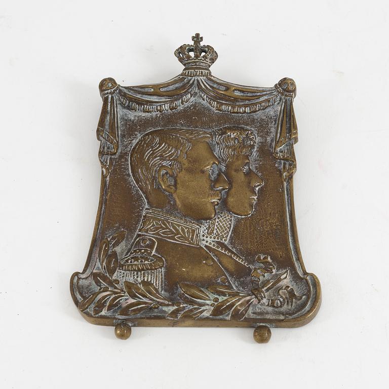 A 19th century bronze plaque.