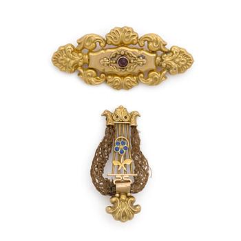 Two 1840s 18K gold brooches.