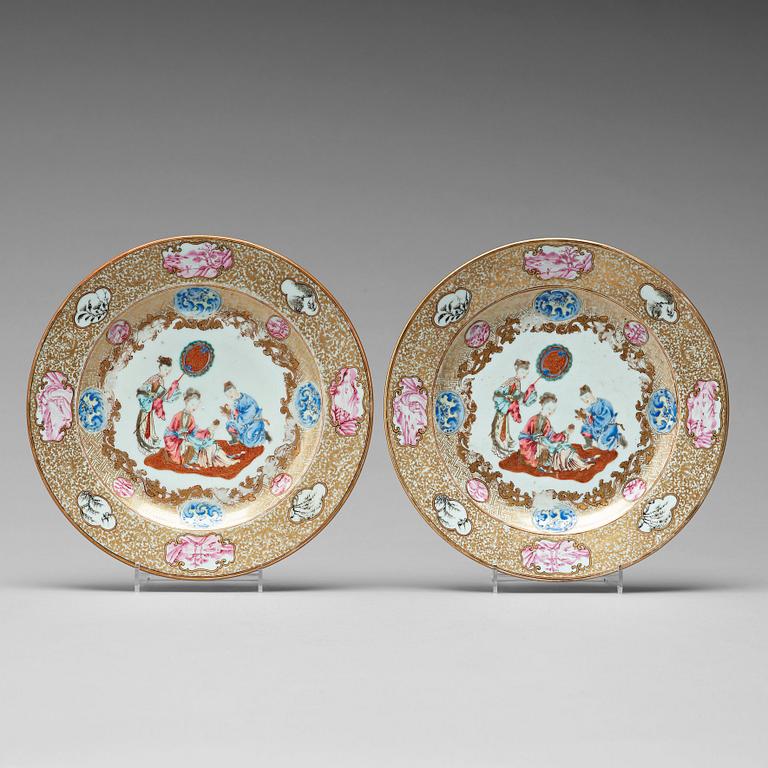 A pair of famille rose dishes with an elegant lady, Qing dynasty, Yongzheng (1723-35).