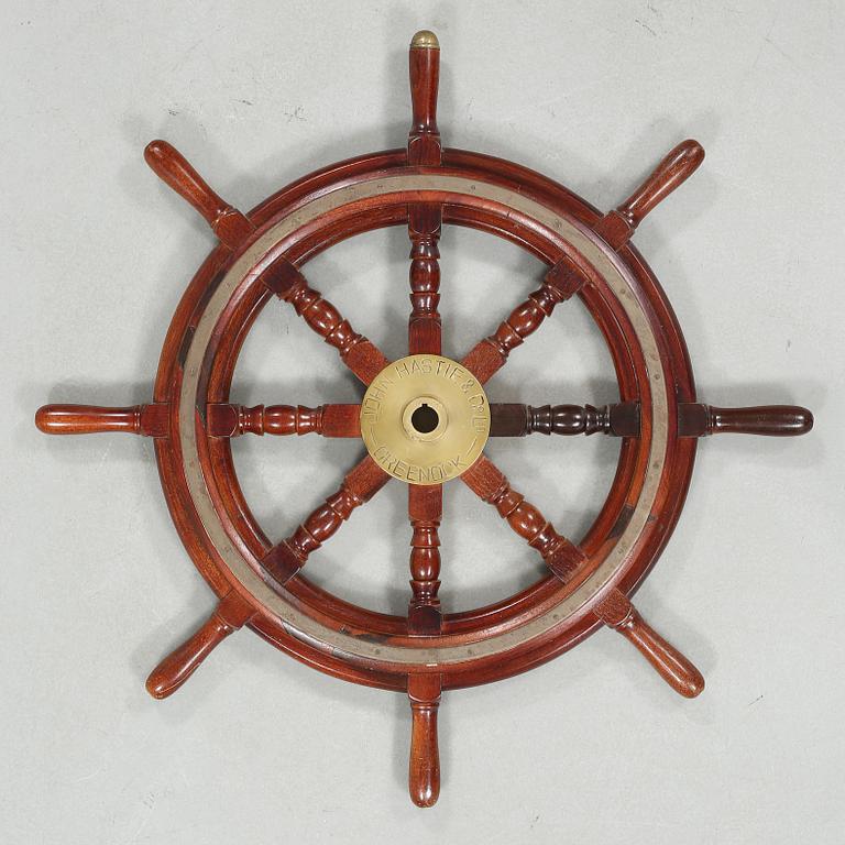 A ship wheel from John Hastie & Co, Greenrock, 20th century.