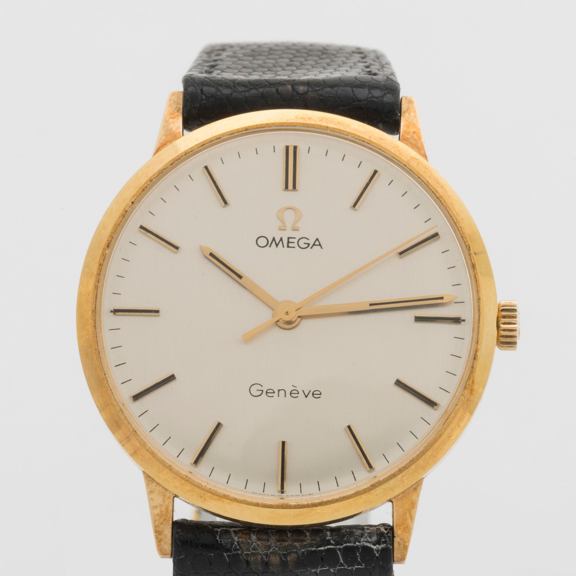 A 14 ct gold Omega Geneve wrist watch.