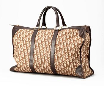 533. A monogram canvas weekendbag by Christian Dior.