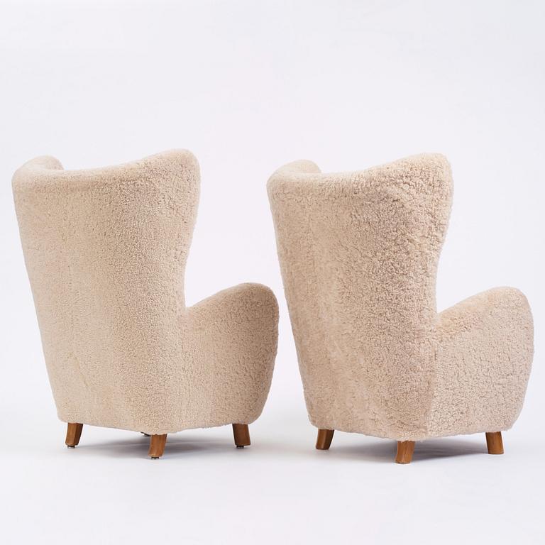 Mogens Lassen, attributed to, a pair of easy chairs, Denmark 1940s.