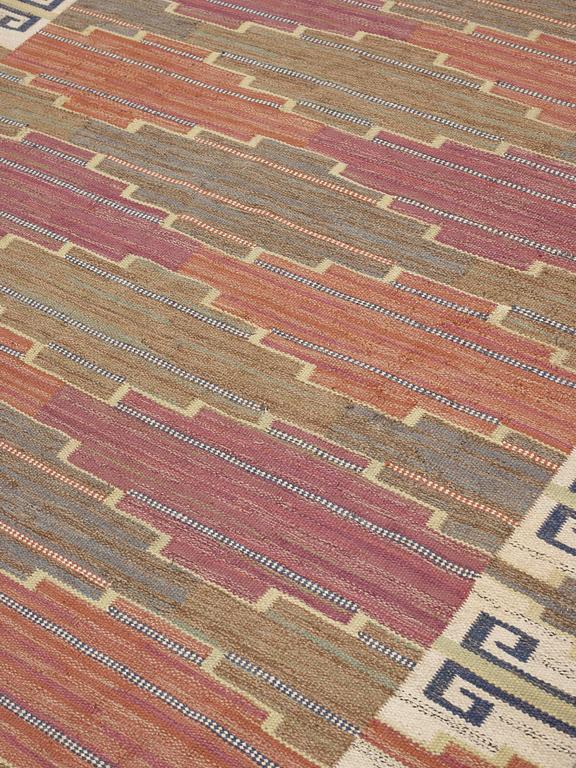 A CARPET, "Bruna heden", flat weave, 306 x 204 cm, signed MMF.