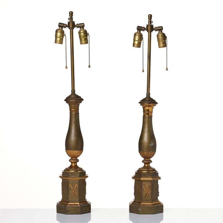 A pair of presumably French tole and brass table lamps, mid 19th century.
