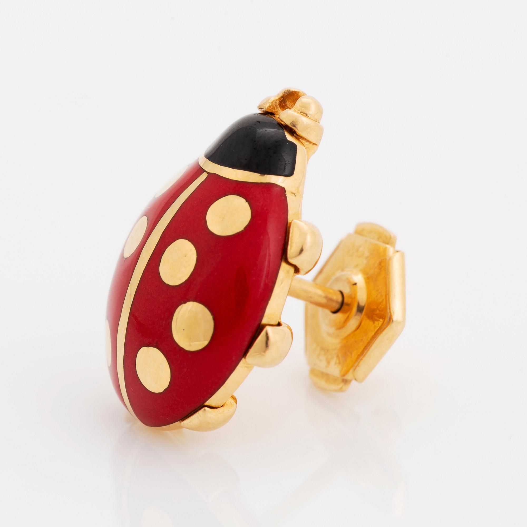 Cartier brosch 18K guld och emalj.