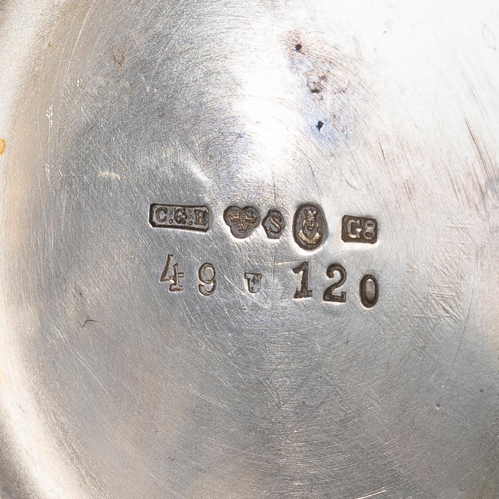 A Swedish silver vase and bowl, marks of CG Hallberg, Stockholm 1933, and Tenn & Silver Ab, Gothenburg 1952 respectively.