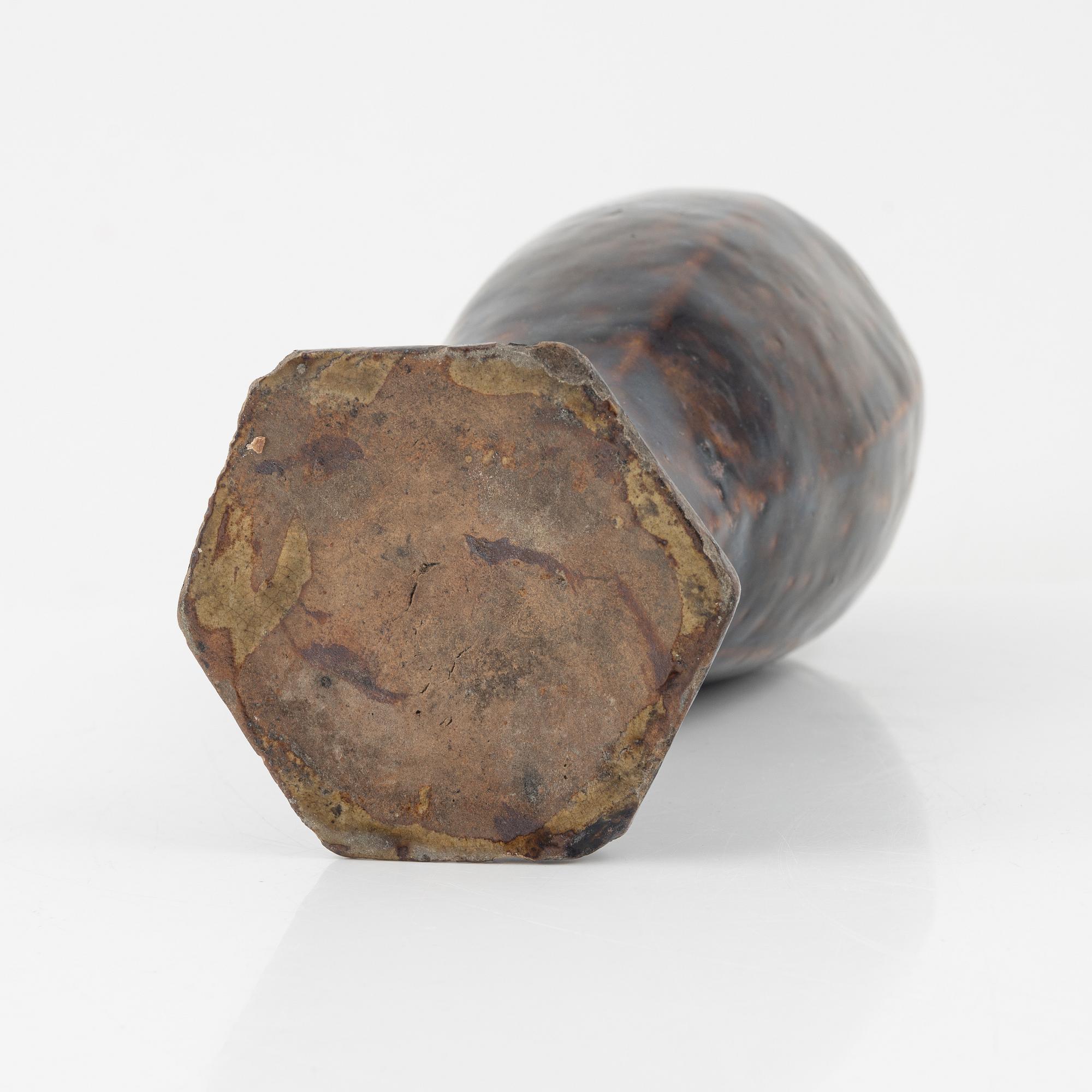 A brown glazed vas, Ming dynasty (1368-1644).