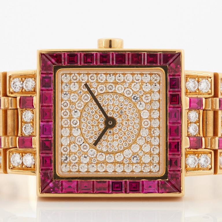 Bulgari damarmbandsur 18K guld med trappslipade rubiner och runda briljantslipade diamanter.
