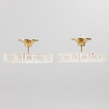 Carl Fagerlund, a pair of ceiling lamps, Orrefors, second half of the 20th century.