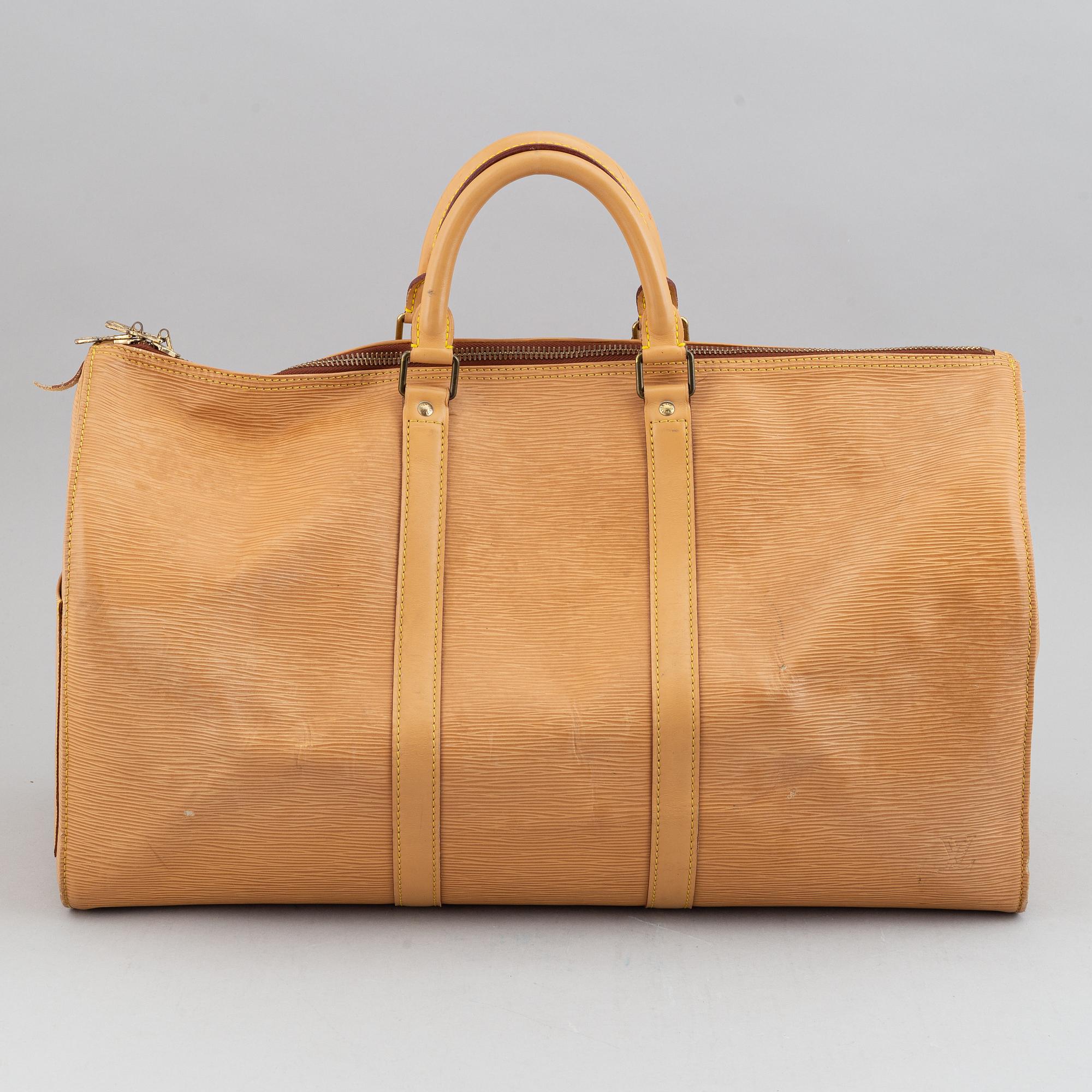 Louis Vuitton, am Epi 'Keepall 50' weekend bag.