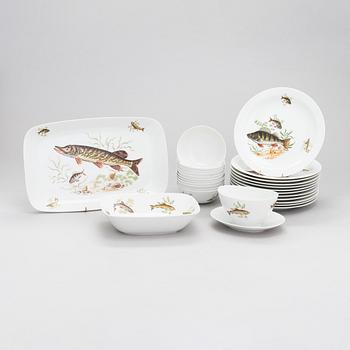 A 25-piece porcelain fish dinnerware set for Rörstrand.