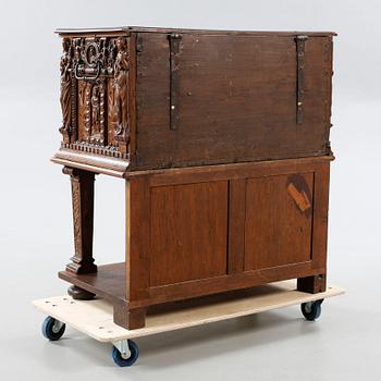 A coffin and a legframe, 18th century respektive 20th century.