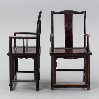 A pair of early 20th century Chinese armchairs.