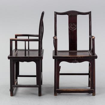 A pair of early 20th century Chinese armchairs.