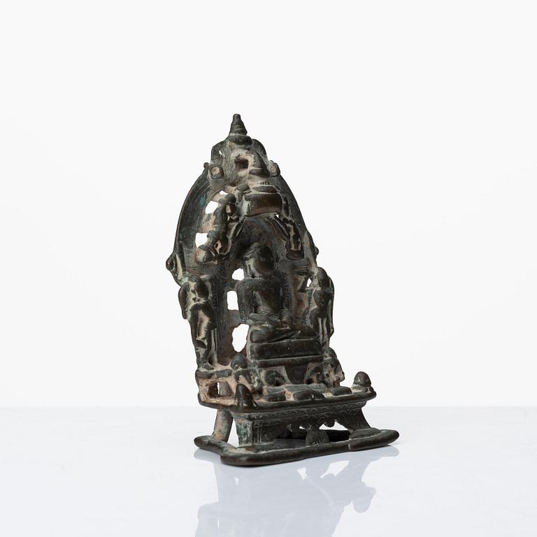 A Jain Shrine, India, copper alloy with silver inlay, 14/15th Century or older.