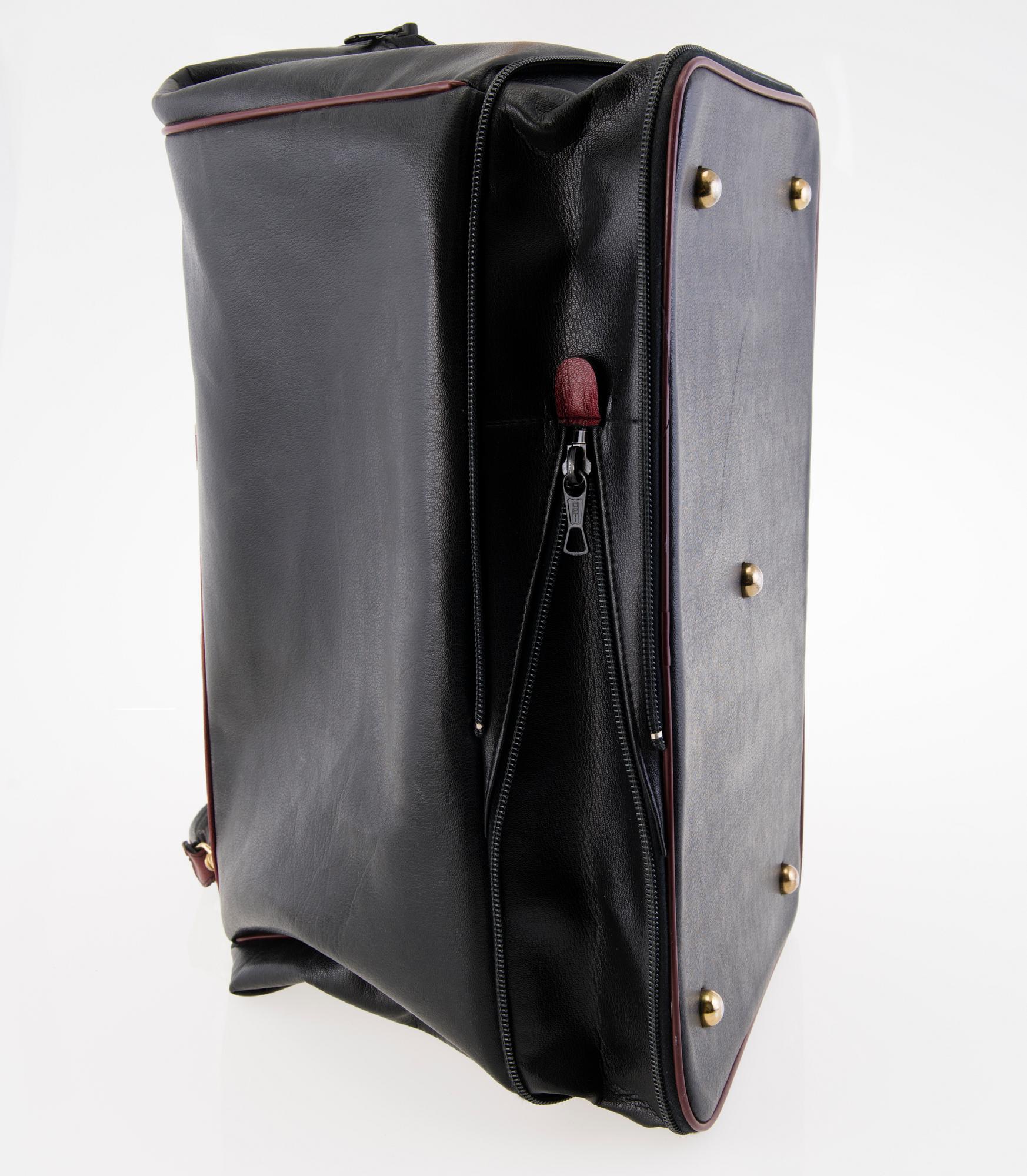 PIERRE CARDIN Vintage Black and burgundy Leather Travel Bag.