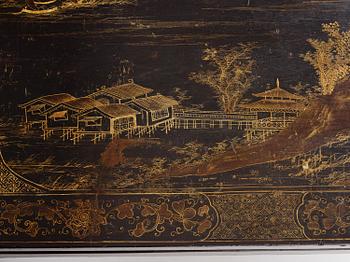 A Chinese painted black lacquer low table, Qing dynasty.