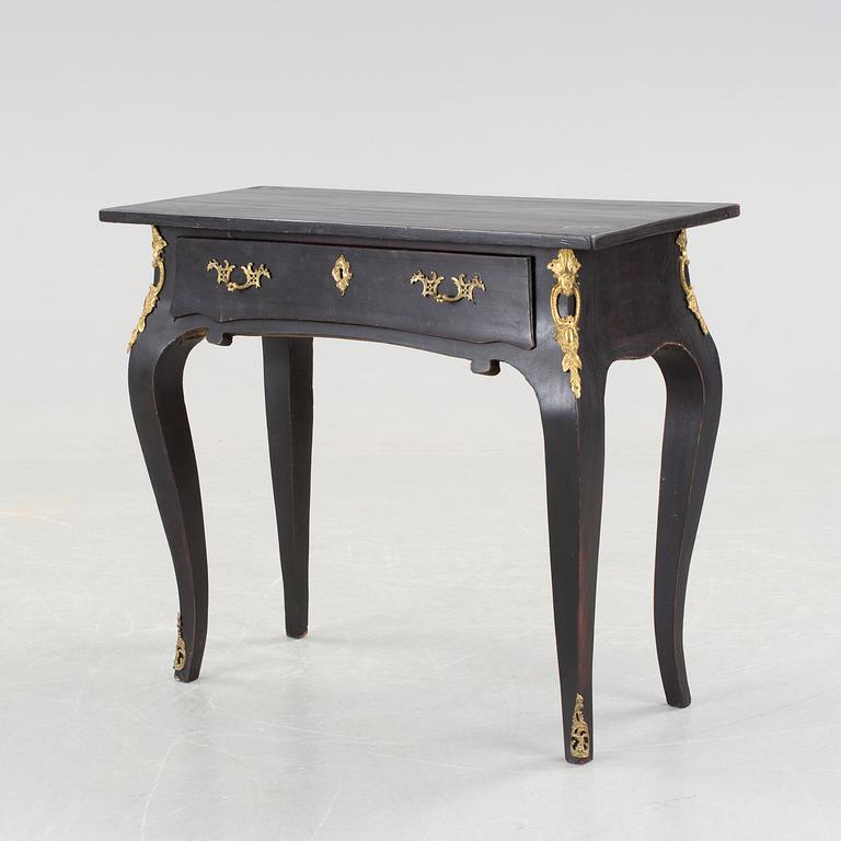 A table in the rococo style, first half of 20th century.