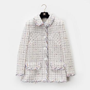 Chanel, a white bouclé jacket, size 34.