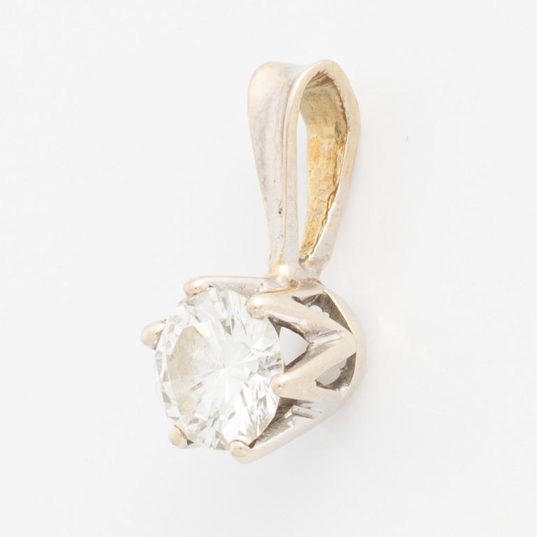 Pendant in 18K gold with a round brilliant-cut diamond.