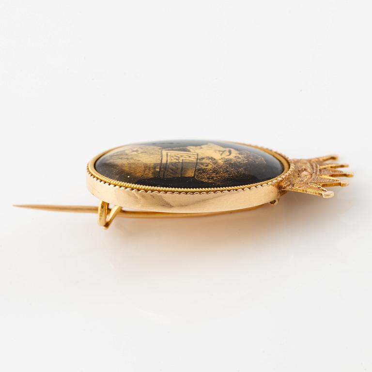 A brooch, 18K gold with a profile portrait of King Karl XIV Johan.