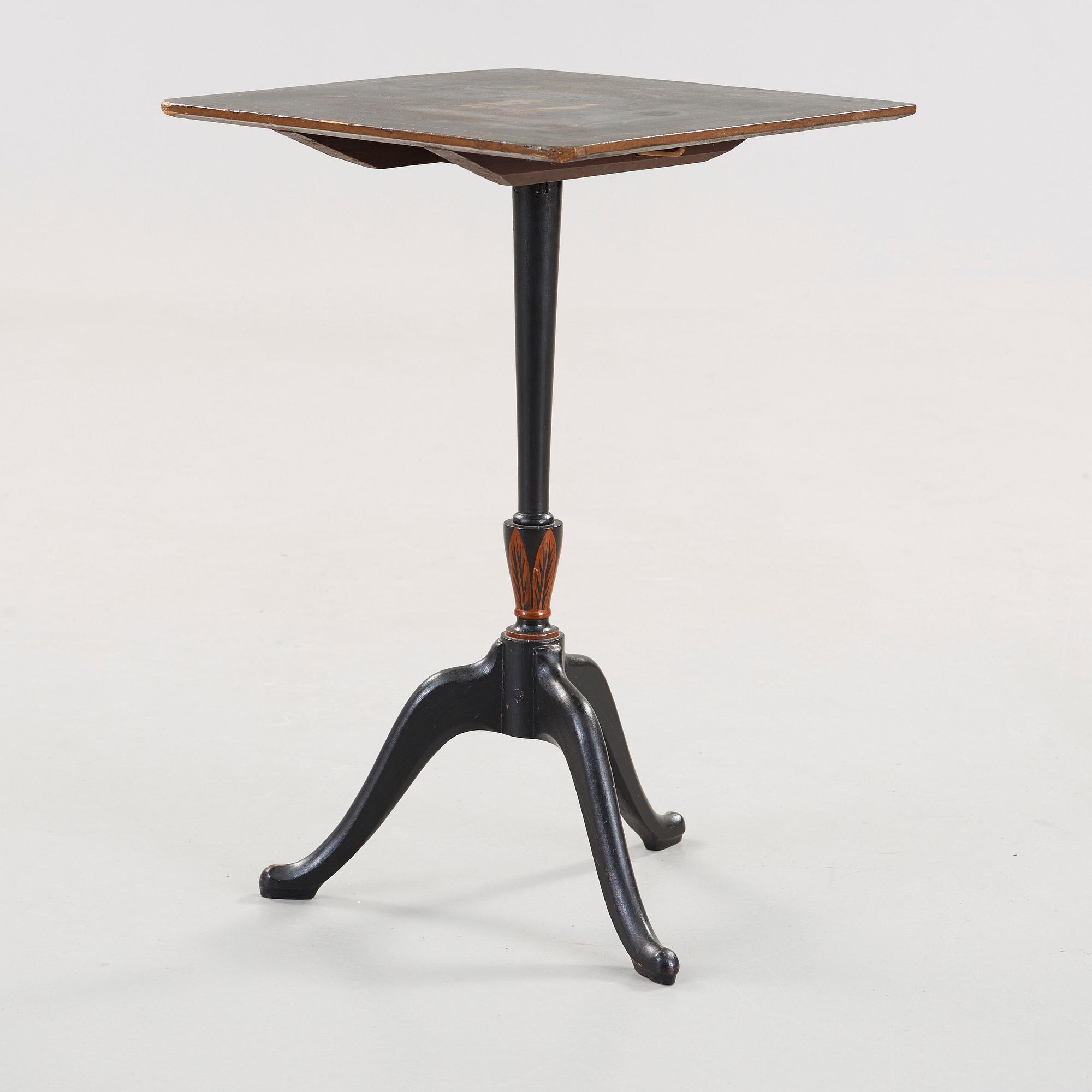 A Swedish tilt top table, from Nils Asplind's workshop, dated 1814.