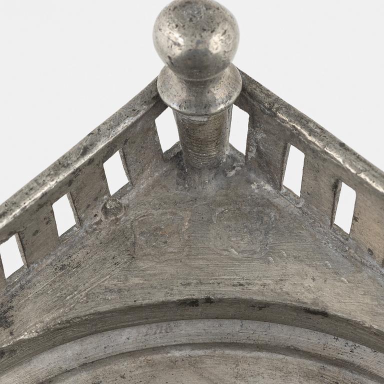 A matched pair of pewter candle sticks, 19th Century.