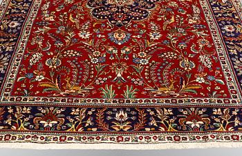 A carpet, Figural Tabriz, ca 310 x 220 cm.