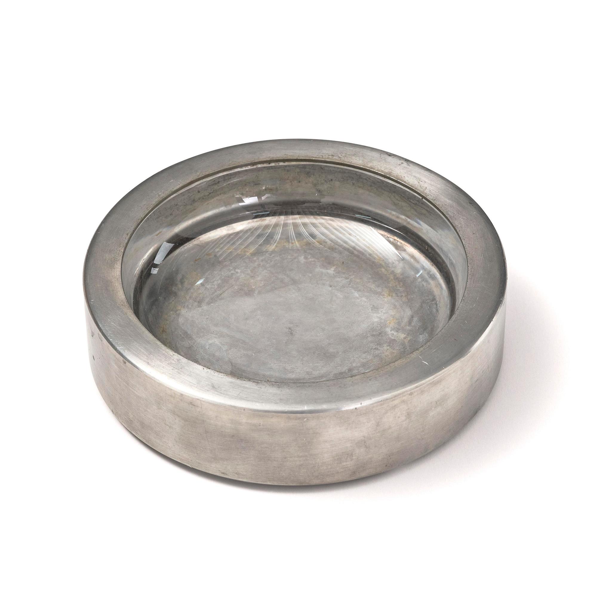 Firma Svenskt Tenn, a pewter and glass ashtray/bowl, Stockholm, 1950.