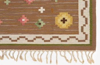 Anna-Greta Sjöqvist, a carpet, 'Blomsteräng', flat weave, ac. 351 x 241 cm, signed AGS.
