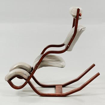 A "Gravity Balans" rocking chair, deisgned by Peter Opsvik, model launched 1983.