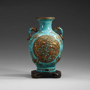 1634. A gold relief against robins egg glazed vase, China, presumably Republich, 20th Century, with Qianlong sealmark.