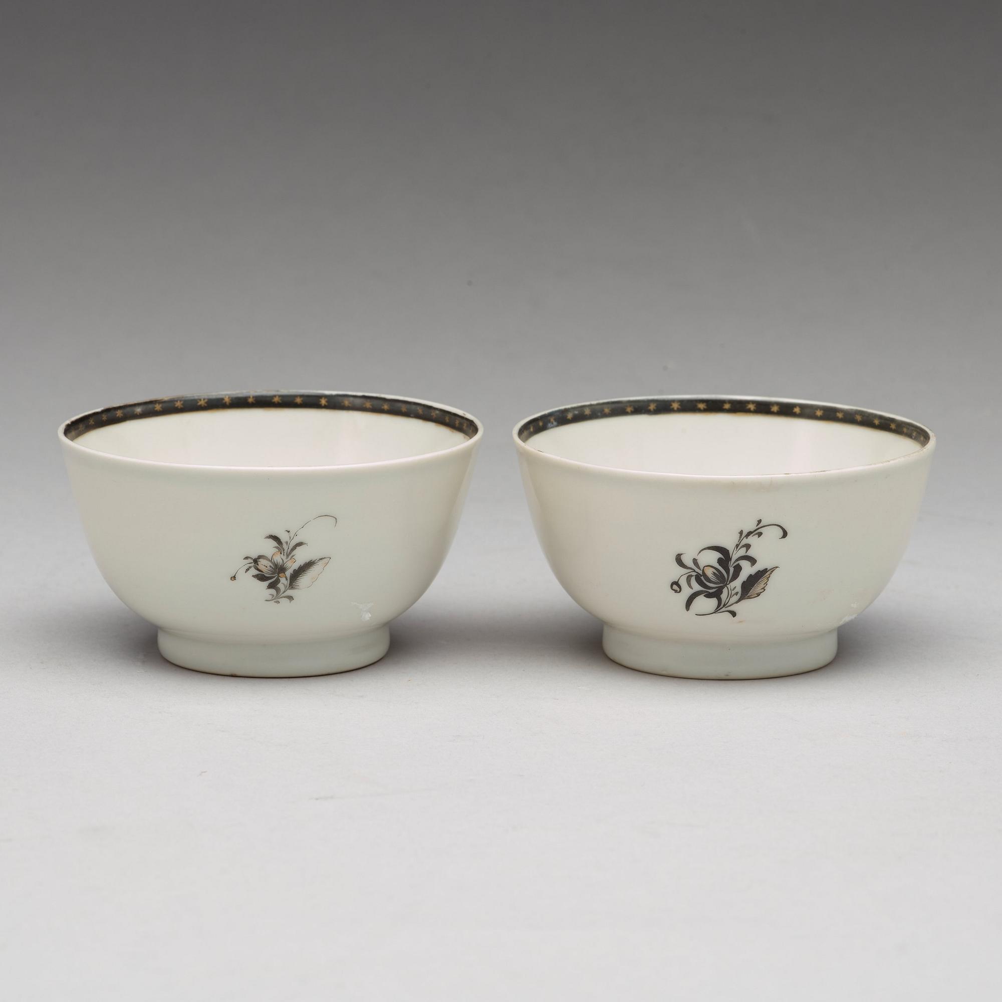 A pair of armorial grisaille cups, Qing dynasty, Qianlong (1736-95).