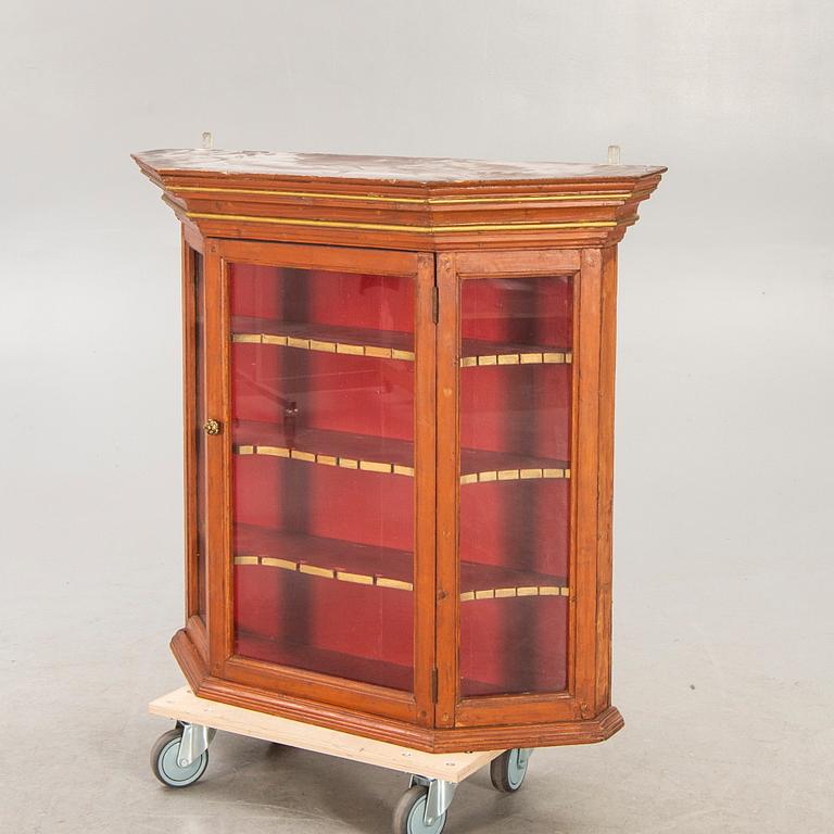 A 19th century wall cabinet.