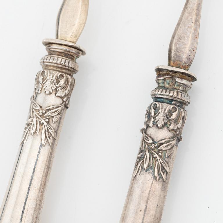 Philippe Berthier, a set of 12 silver oysterforks, mid 19th century.