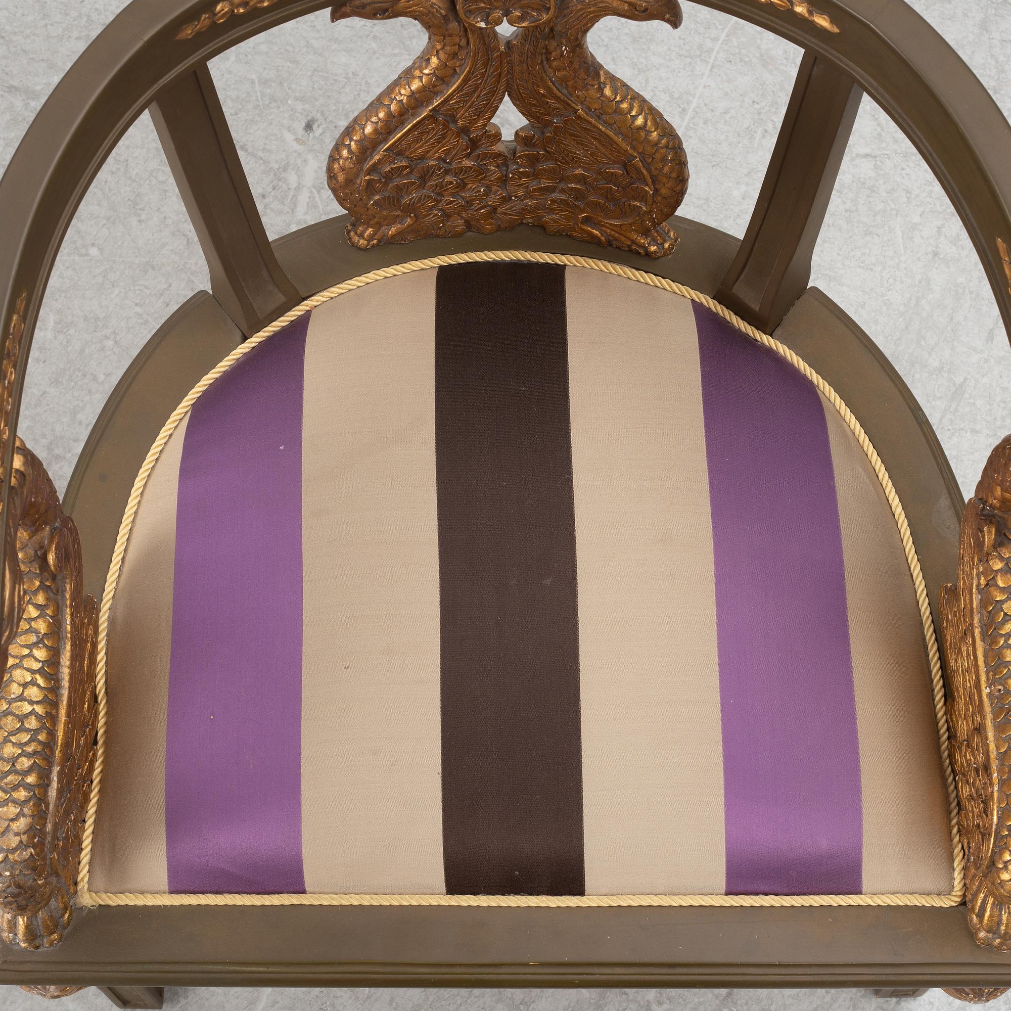 A pair of chairs and a side table, second half of the 20th century. Empire style.