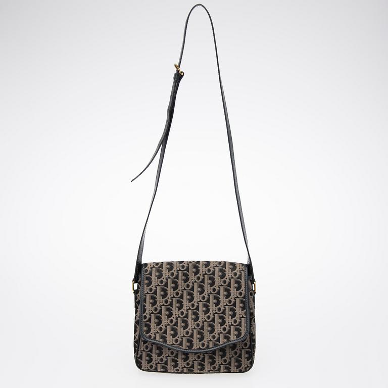 A Dior Canvas Crossbody Bag.