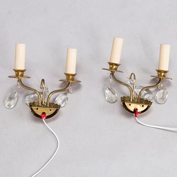 Four of mid-20th century wall sconces.