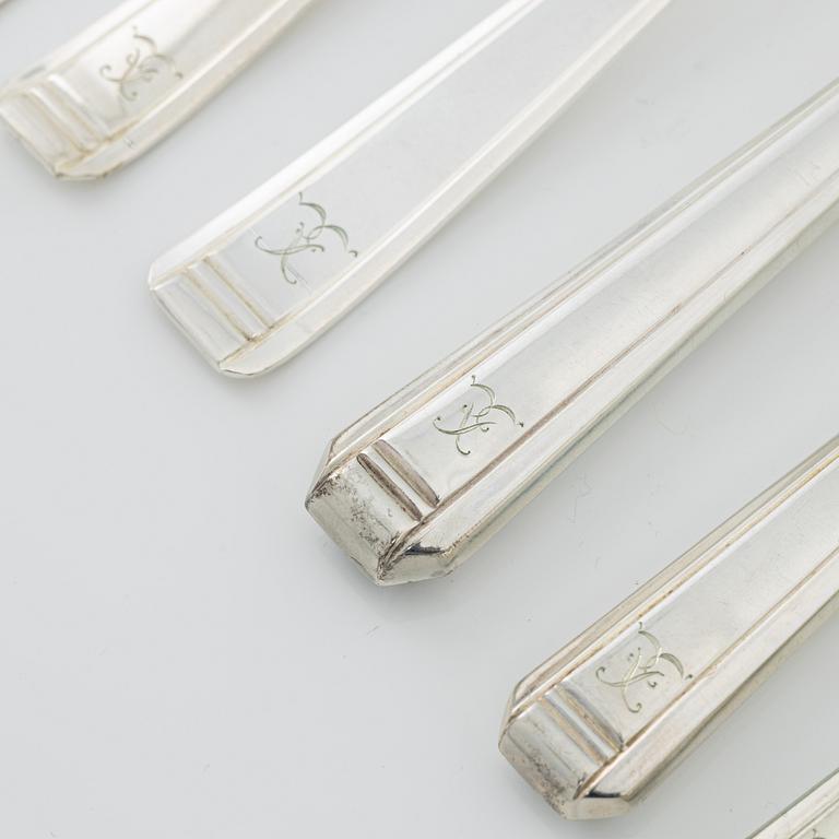 A 120- piece silver cutlery, bearing Swedish import marks, including CG. Hallberg, Stockholm, 1932.