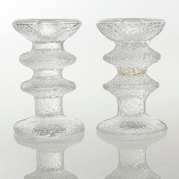 Five glass candlesticks by Timo Sarpaneva for Iittala, model "Festivo", second half of the 20th century.
